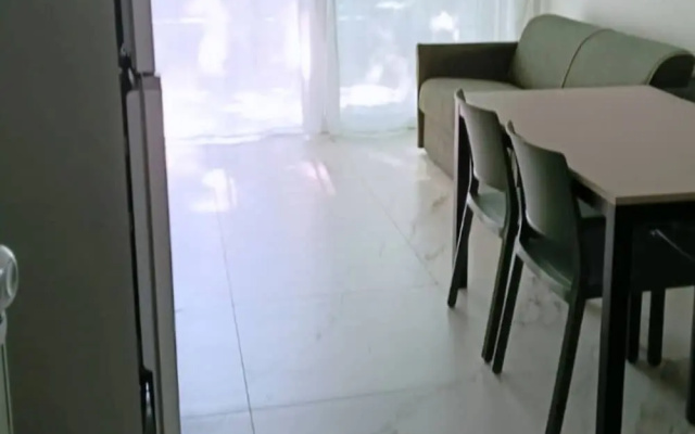Renovated Flat With Private Fenced Garden in Bibione