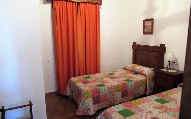 Отель Chalet Huerta 1 con piscina y paddle комната для гостей