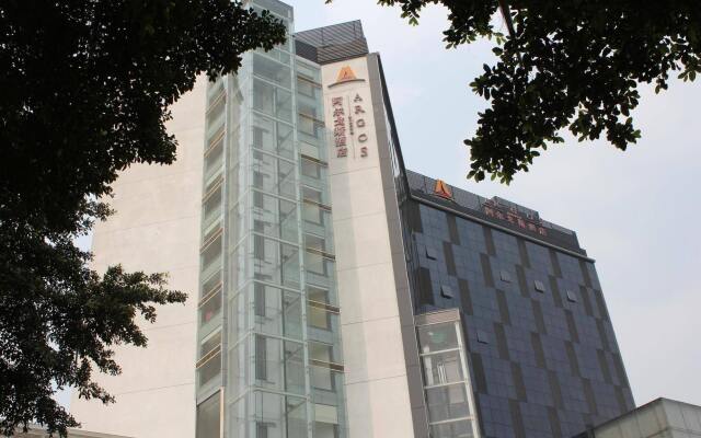 Guangzhou Hui Li Hua Yuan Holiday Hotel вид на фасад
