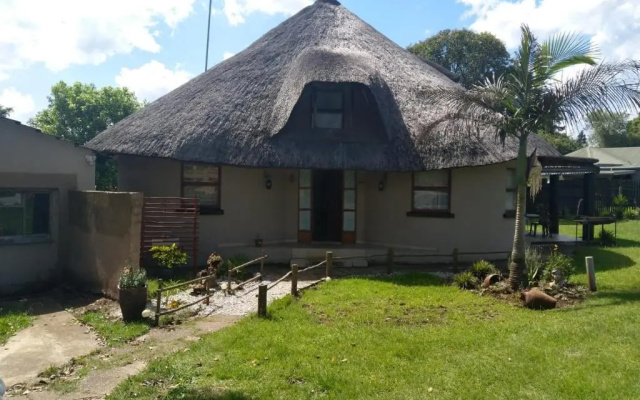 Thatched roof 4 bedroom house air-conditioned