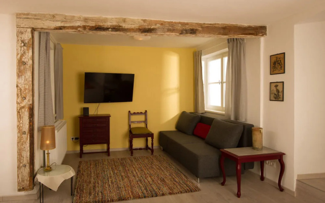 Golden Roof Apartments by Penz
