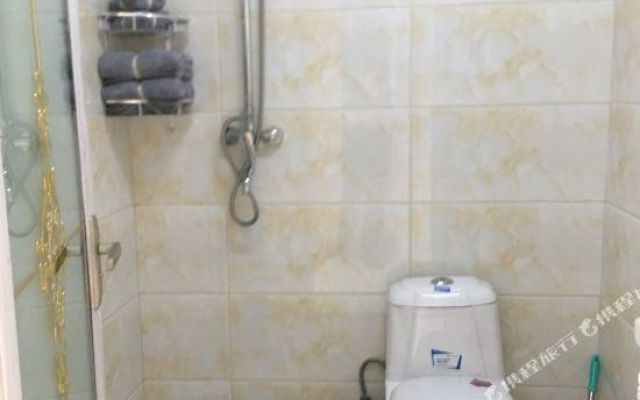 Huacai Apartment Hotel (Beijing Qilinshe)