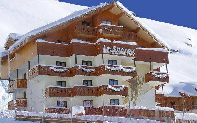 Отель Le Sherpa Val Thorens Hôtels-Chalets de Tradition вид на фасад