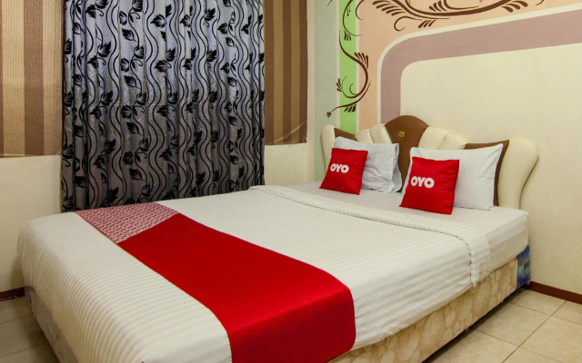 OYO 2208 Thyesza Hotel