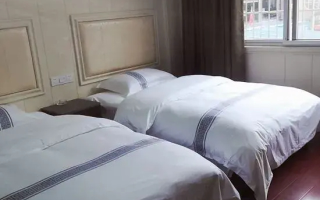 Guzhang Pingji Hotel
