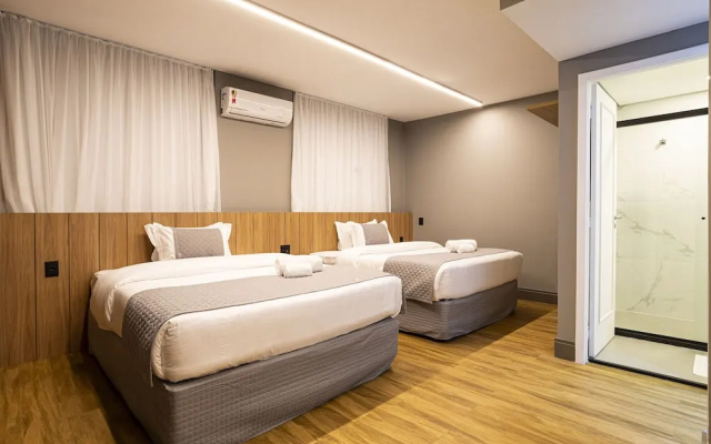 You Stay at Vila Olimpia - The World