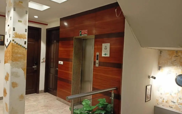 Cosy Grand @Chanakyapuri by The Cosy Hotels.