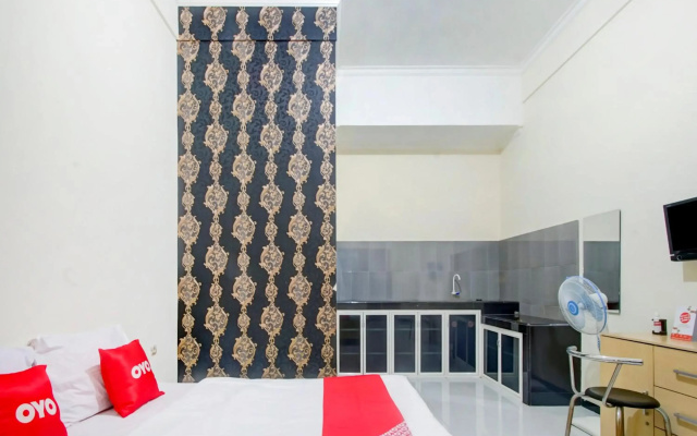 Capital O 90151 Guest House 180
