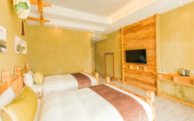 Floral Hotel Fenghuang Huercaowu