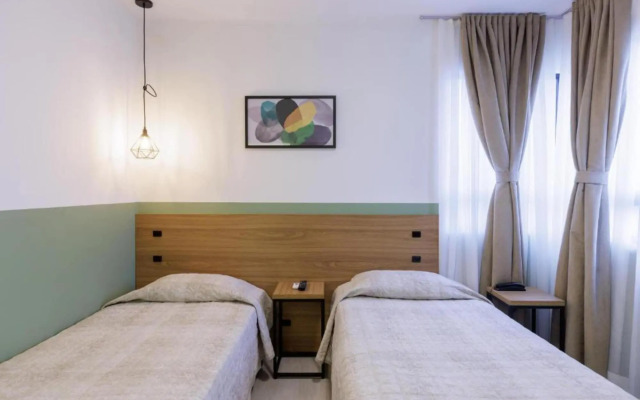 Le Village Flats e Hotel