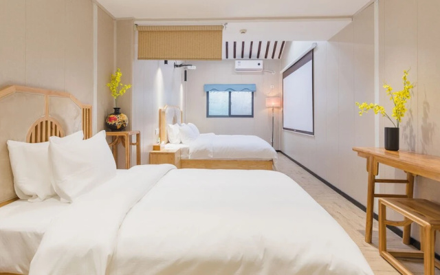 Floral Hotel Yi Shu Yu She Zhouzhuang