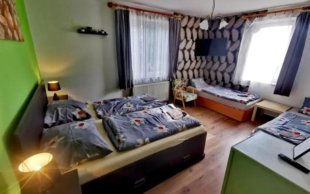 Gyöngyvirág Ház