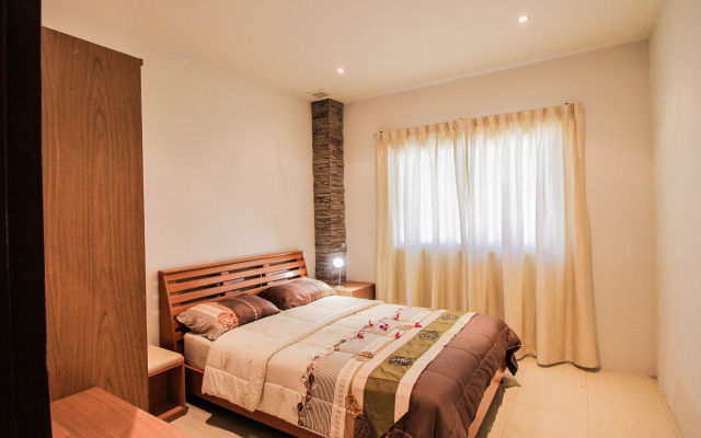 Апартаменты New Nordic Villas & Apartment by Pattaya Sunny Rentals Паттайя комната для гостей