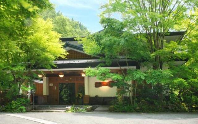 Отель Kurokawa Onsen Oku no Yu Минамиогуни вид на фасад