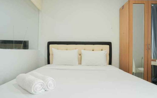 Simply and Cozy Studio Titanium Square Apartment By Travelio