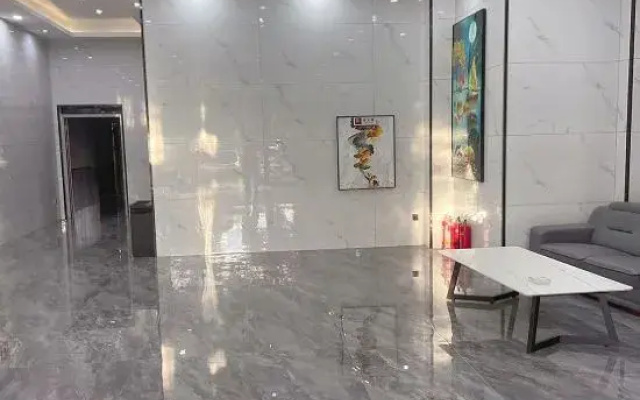Qiongzhong Santaiyuanlong Business Hotel