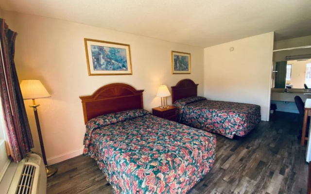 Travelers Place Inn & Suites