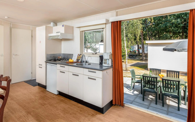 Comfortable chalet with microwave in natural surroundings
