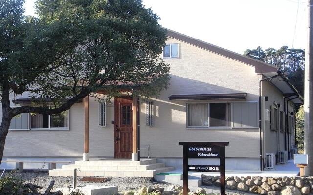 Отель Guesthouse Yakushima Якусима вид на фасад