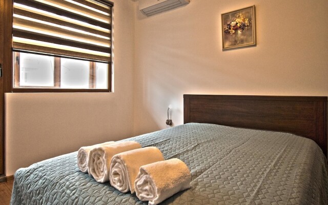Апартаменты Travellino Serviced Apartments комната для гостей