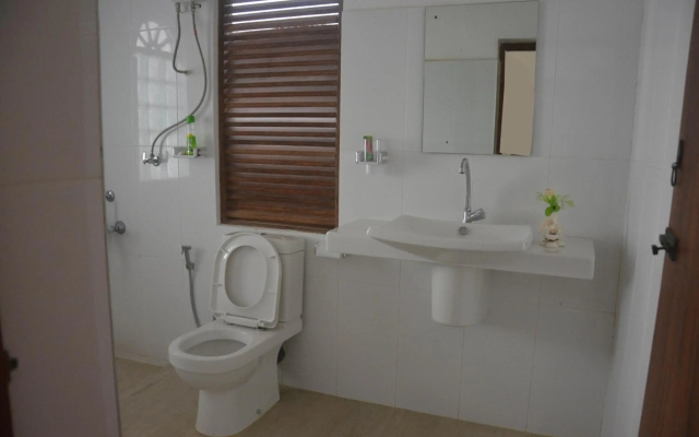Green White Deluxe Room