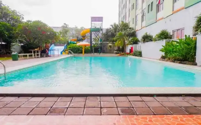 Comfy and Homey 2BR at Dian Regency Apartment By Travelio