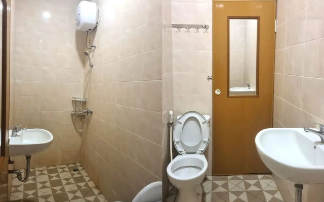 Hotel O Adam Malik Guesthouse Near Stasiun Medan