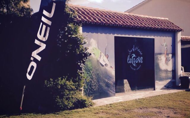 Отель La Curva Surfhouse Испания, Рибамонтан-аль-Мар - отзывы, цены и фото номеров - забронировать отель La Curva Surfhouse онлайн вид на фасад