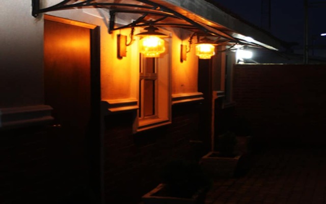 Отель Cotton Suites вид на фасад