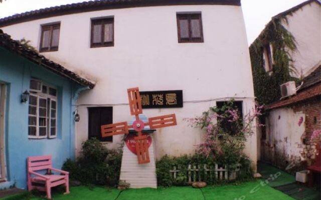 Отель Zhouzhuang Hills International Youth Hostel Китай, Сучжоу - отзывы, цены и фото номеров - забронировать отель Zhouzhuang Hills International Youth Hostel онлайн вид на фасад