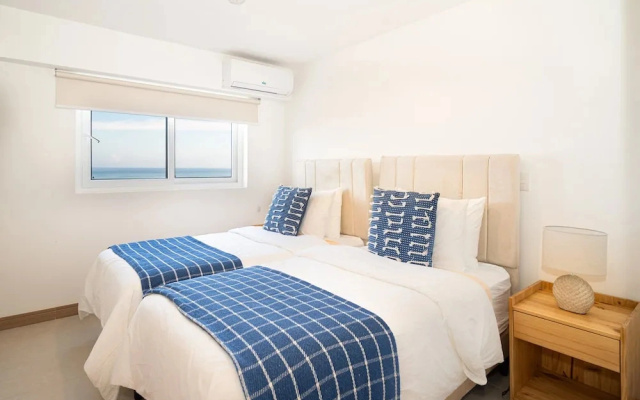 Ocean View Condo Steps to Beach & Comfort