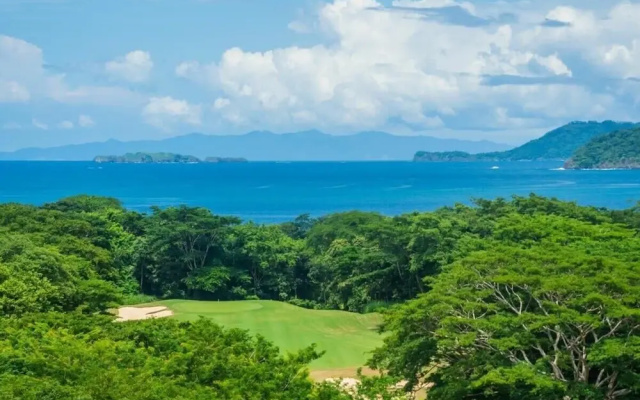 Stunning Luxury Penthouse in Exclusive Beachfront Community with Resort-Style Amenities & Sweeping Views of the Ocean & Golf Course