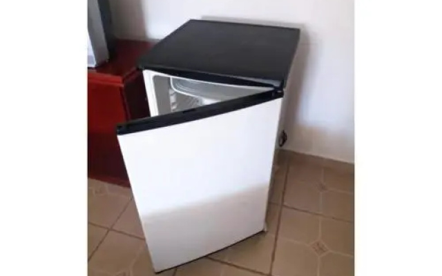 SUíTE EM NOSSA CASA A 450M DA PRAIA