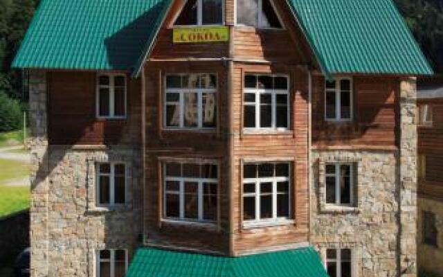 Sokol Hotel Домбай вид на фасад
