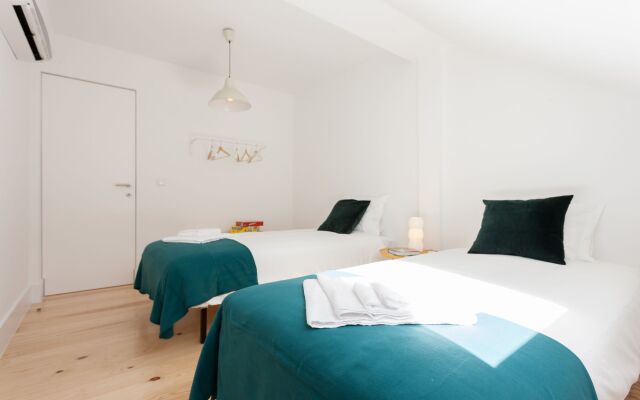 Апартаменты Santa Justa Apartments 24, Downtown Center комната для гостей
