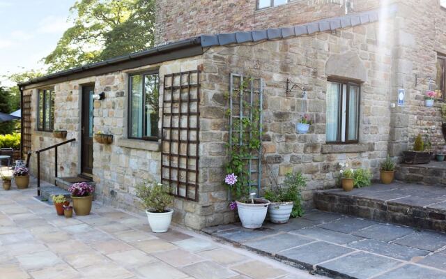 Отель The Cottage at Moseley House Farm вид на фасад
