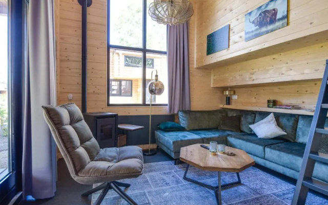 Fraai Tiny House aan het veluwemeer met uitzicht & veranda