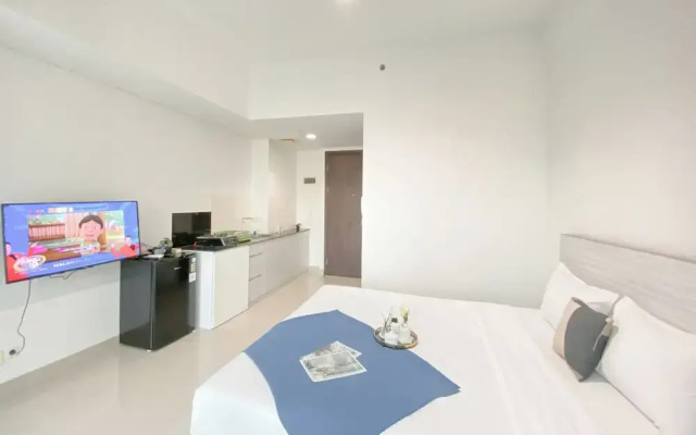 Simple White Designed Studio At Lrt City Bekasi Apartment