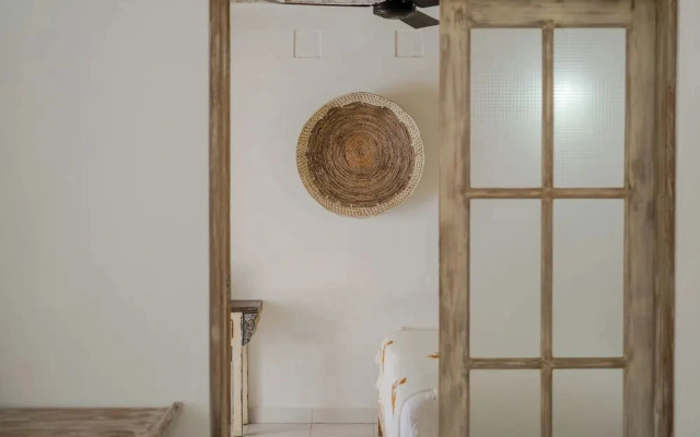 Peacock Bungalow by Pertama Stay
