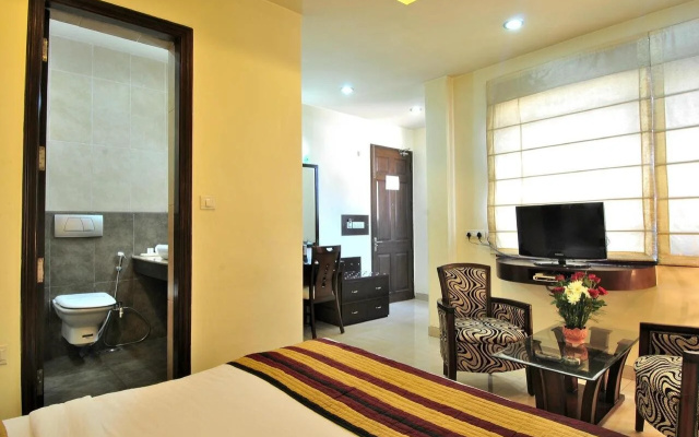 Cosy Grand @Chanakyapuri by The Cosy Hotels.