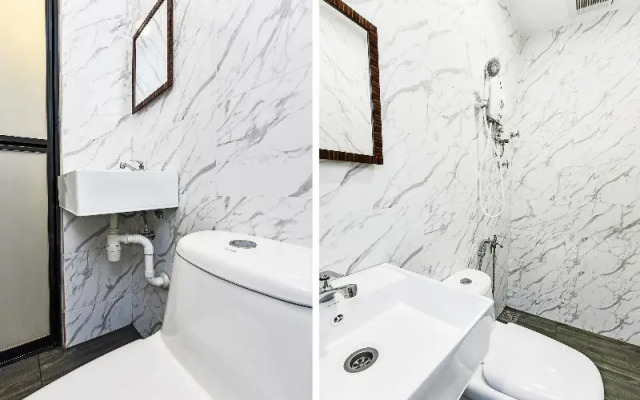 Th Hotel by OYO Rooms