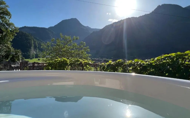 Romantic private superior Swiss Chalet with Hottub