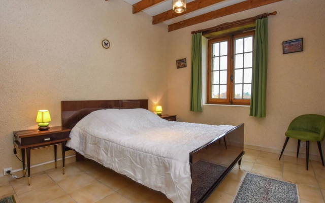 Lovely holiday home in Biron with fenced swimming pool