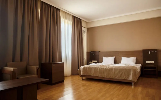 Olympus Hotel By Umbrella