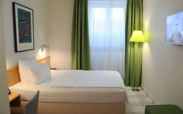 Отель Design Hotel Stadt Rosenheim Германия, Мюнхен - отзывы, цены и фото номеров - забронировать отель Design Hotel Stadt Rosenheim онлайн комната для гостей