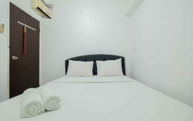 New Furnished 2BR at Mutiara Bekasi Apartment By Travelio