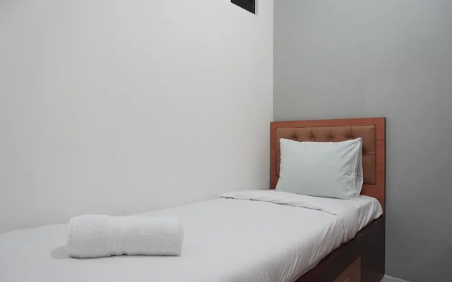 Homey and Warm 2BR Green Pramuka Apartment