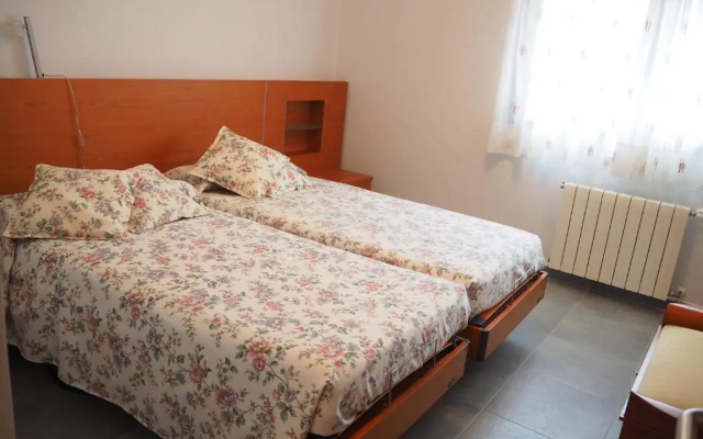 Casa l'Escala, piscina comuntària i jardí privat