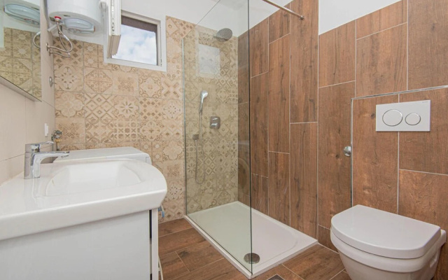 Awesome Home in Jezera with Hot Tub, WiFi & 1 Bedrooms