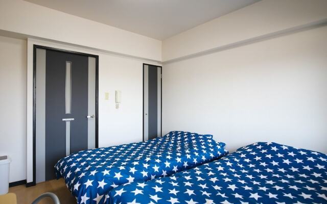 Апартаменты Sumiyoshi apartment Хаката комната для гостей